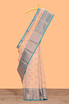 Peach checked leaf zari motifs design semi soft silk saree with contrast zari border and blouse