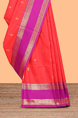 Coral pink Semi Soft Silk Saree delicate butta motifs with contrasting pallu elegant zari border along with contrast buttas blouse