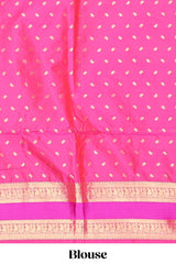 Coral pink Semi Soft Silk Saree delicate butta motifs with contrasting pallu elegant zari border along with contrast buttas blouse