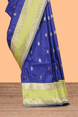 Royal blue Semi Soft Silk Saree delicate butta motifs with contrasting pallu elegant zari border along with contrast buttas blouse