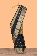 Black Semi Soft Silk Saree butta detailing rich gold zari borders traditional paisley motifs along with matching blouse