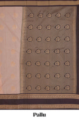 Peach checked floral zari motifs design semi soft silk saree with contrast border and zari blouse
