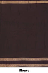 Peach checked floral zari motifs design semi soft silk saree with contrast border and zari blouse