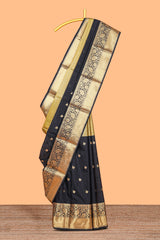 Black floral butta detailed Semi Soft Silk Saree with rich gold floral zari borders along with matching blouse