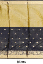 Black floral butta detailed Semi Soft Silk Saree with rich gold floral zari borders along with matching blouse