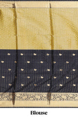 Black floral butta detailed Semi Soft Silk Saree with rich gold floral zari borders along with matching blouse