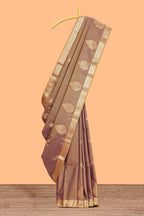 Brown floral design motifs semi soft silk saree with contrast border and blouse