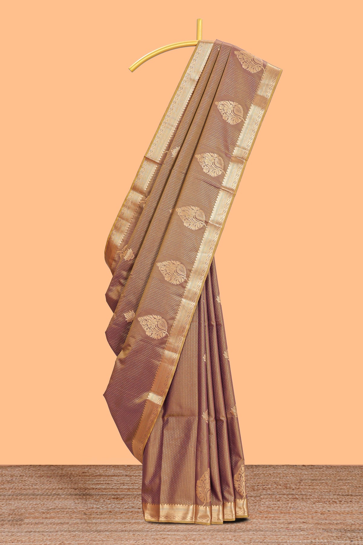 Brown floral design motifs semi soft silk saree with contrast border and blouse