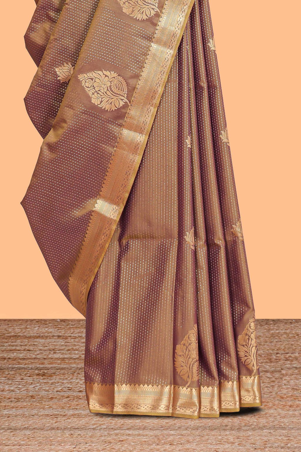 Brown floral design motifs semi soft silk saree with contrast border and blouse