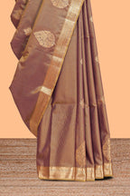 Brown floral design motifs semi soft silk saree with contrast border and blouse