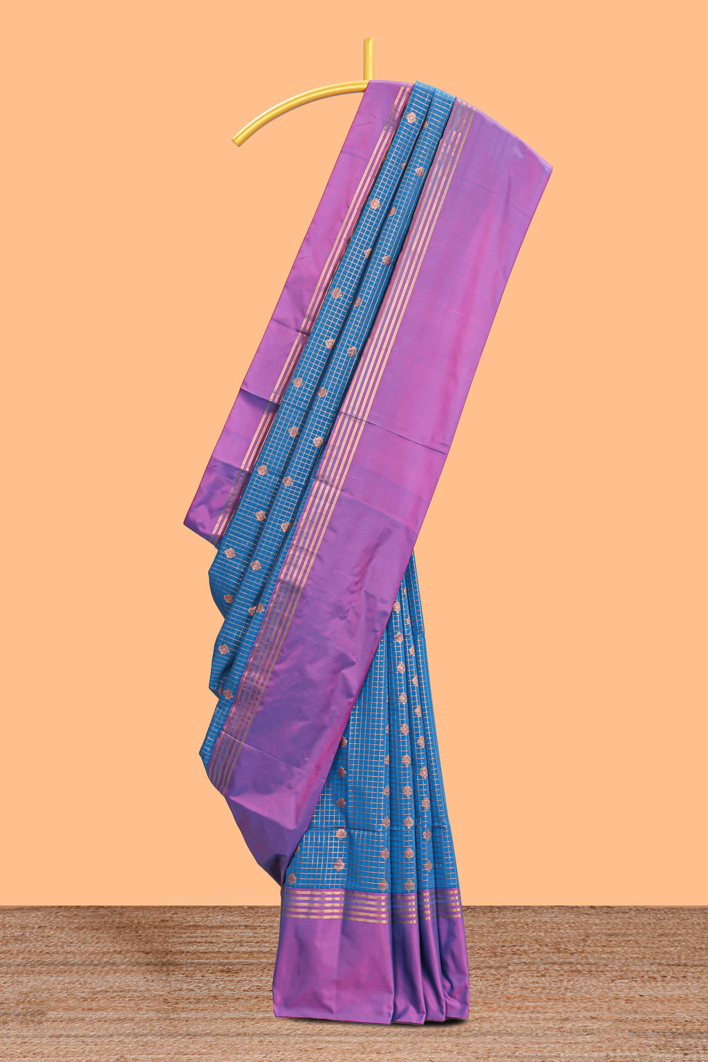 Steel blue checked floral design motifs semi soft silk saree with contrast border and blouse