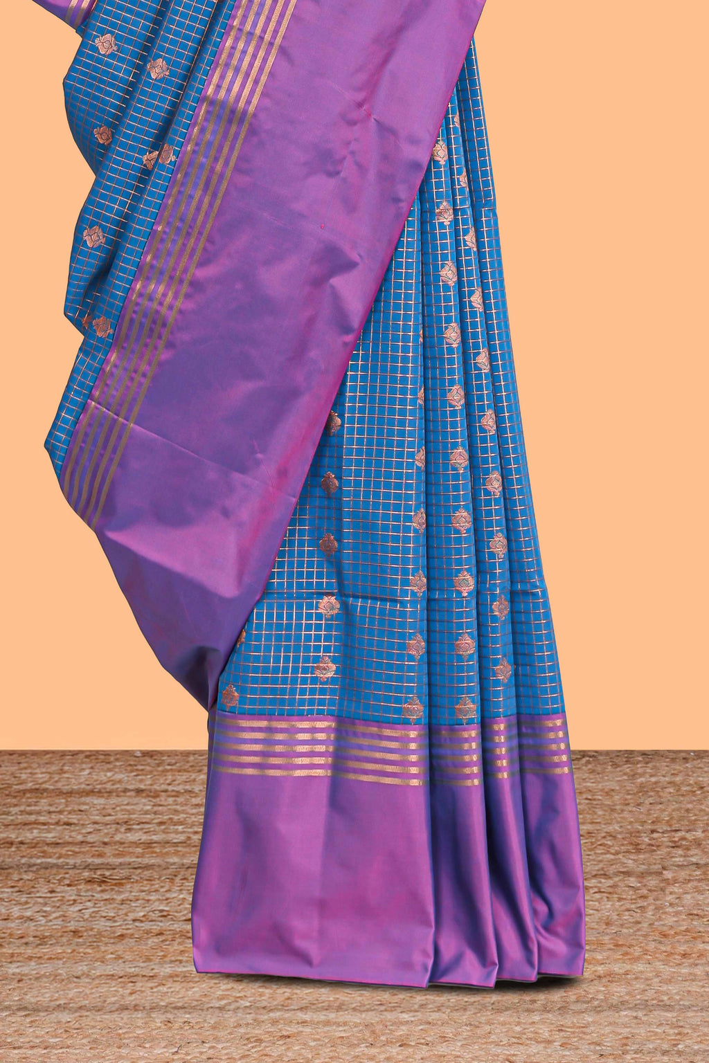 Steel blue checked floral design motifs semi soft silk saree with contrast border and blouse