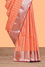 Orange striped floral design semi soft silk saree with contrast border and blouse