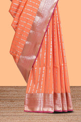 Orange striped floral design semi soft silk saree with contrast border and blouse