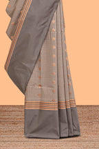 Grey checked floral design motifs semi soft silk saree with contrast border and blouse