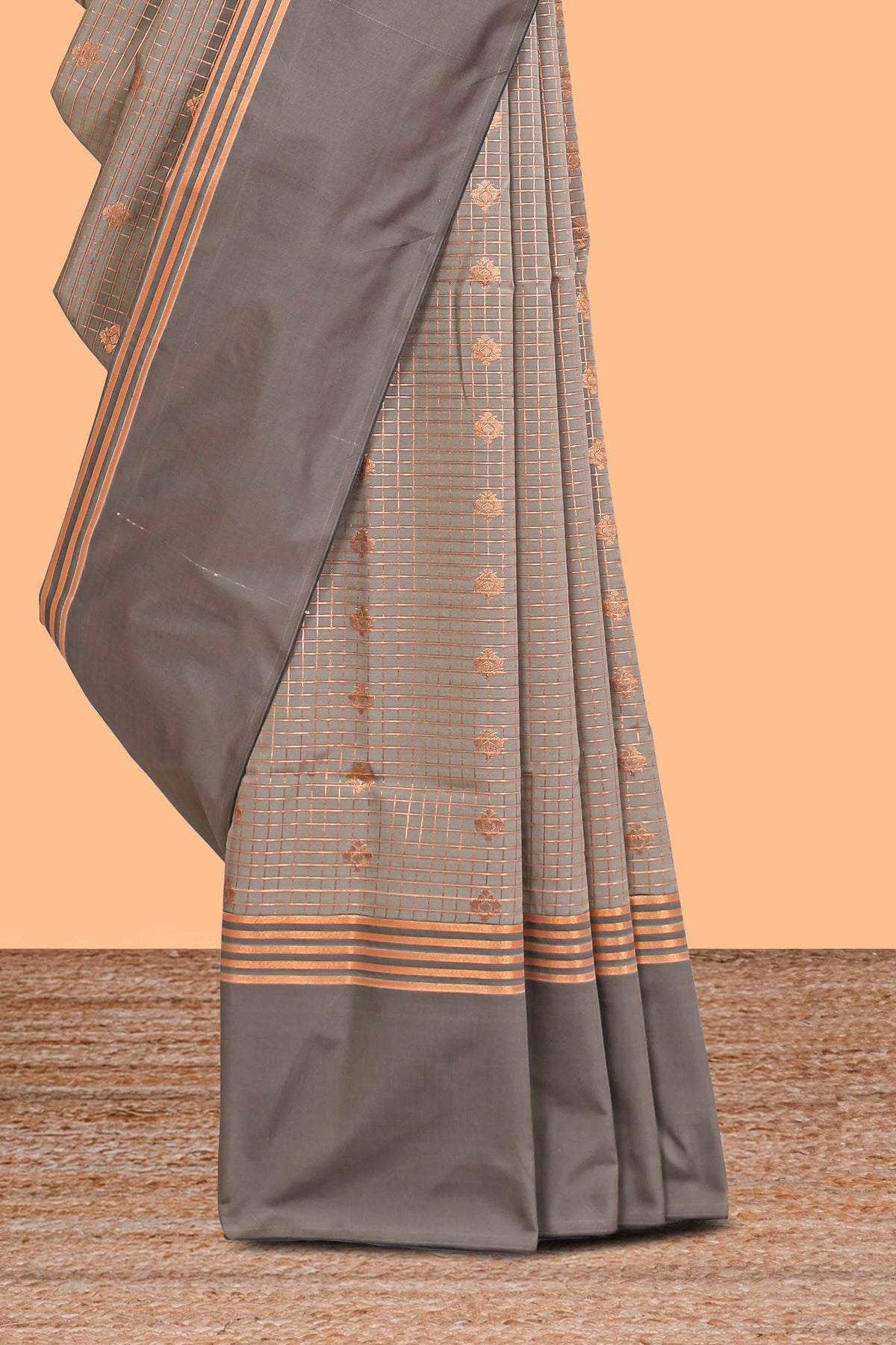 Grey checked floral design motifs semi soft silk saree with contrast border and blouse