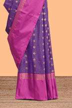 Purple checked floral design motifs semi soft silk saree with contrast border and blouse