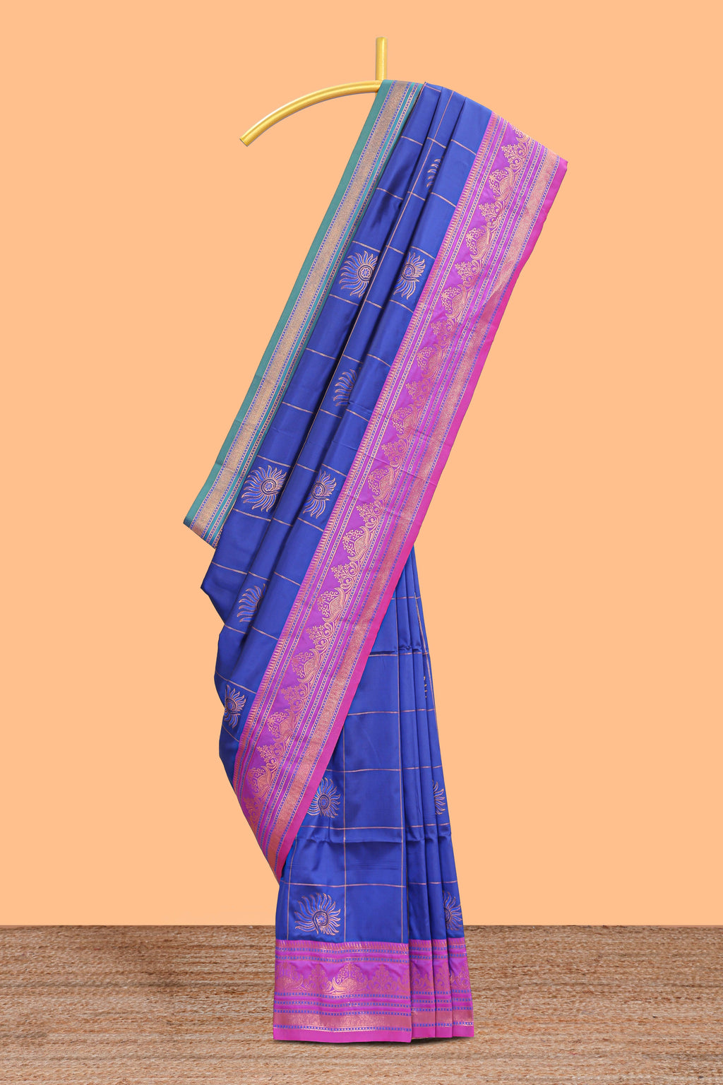 Blue checked floral design motifs semi soft silk saree with contrast border and matching blouse