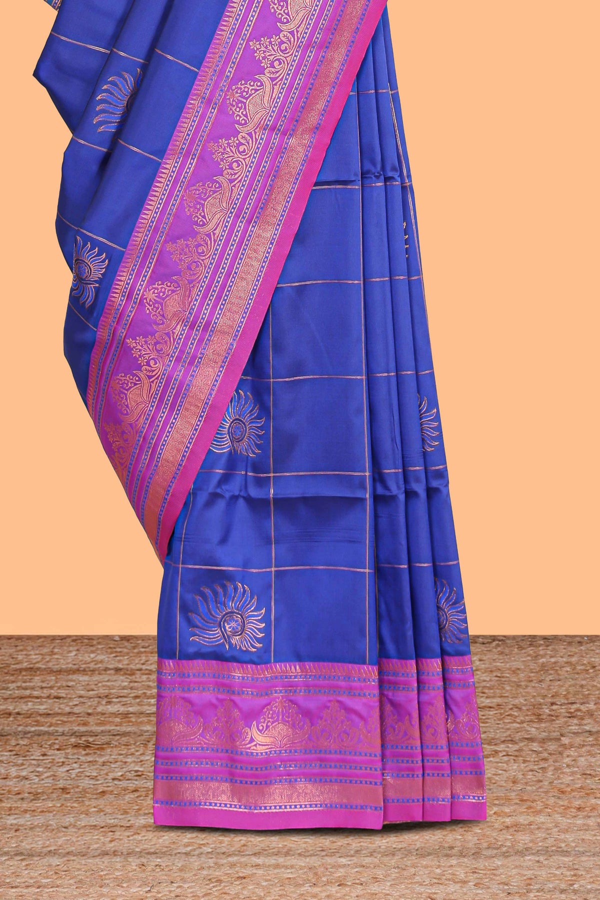Blue checked floral design motifs semi soft silk saree with contrast border and matching blouse