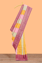 Multi color checked floral design motifs semi soft silk saree with contrast border and blouse