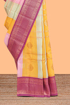Multi color checked floral design motifs semi soft silk saree with contrast border and blouse