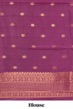 Multi color checked floral design motifs semi soft silk saree with contrast border and blouse