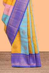 Multi color checked floral design motifs semi soft silk saree with contrast border and blouse