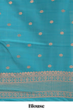 Multi color checked floral design motifs semi soft silk saree with contrast border and blouse