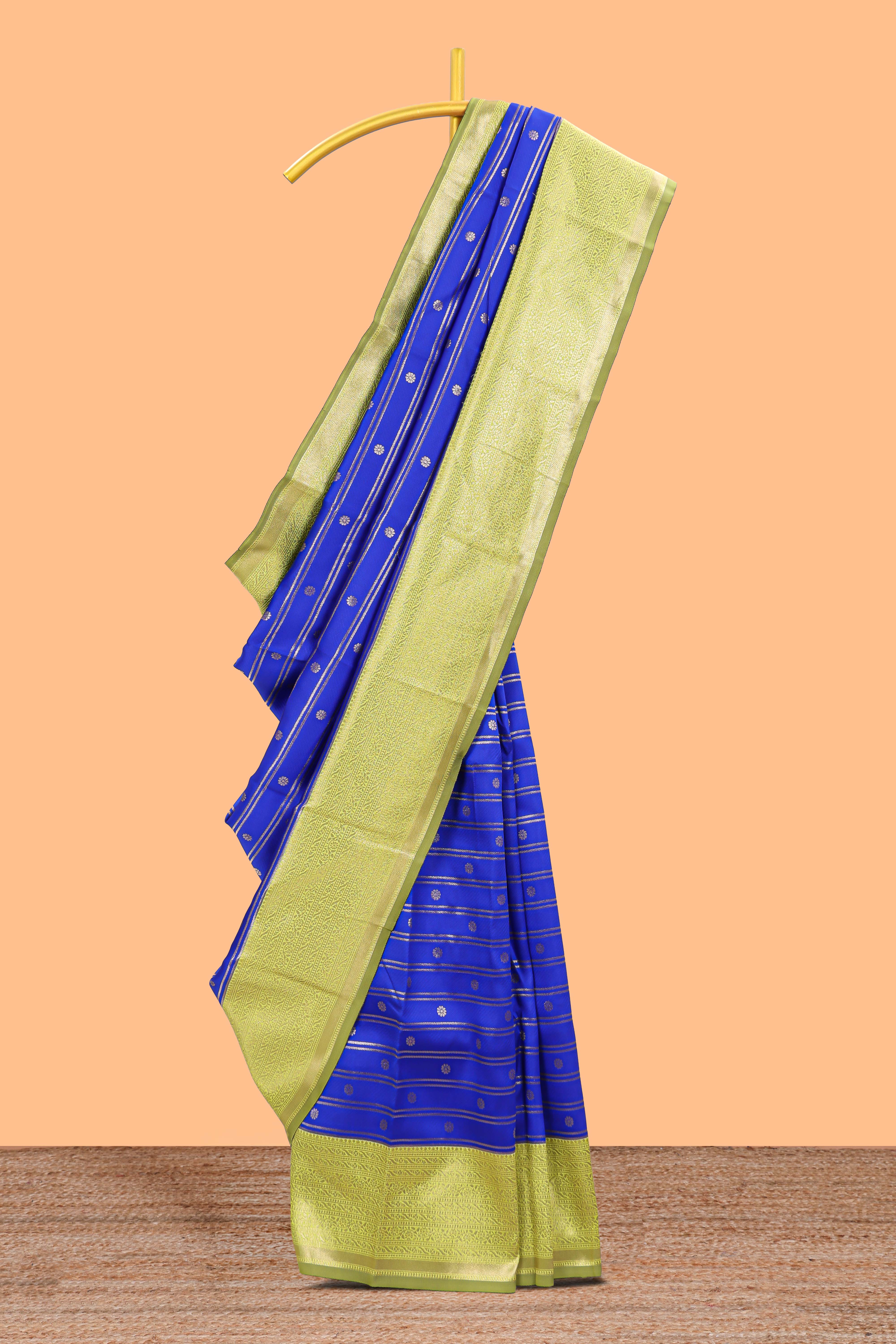 Blule striped and butta detailed Semi Soft Silk Saree with contrast zari border along with contrasting blouse