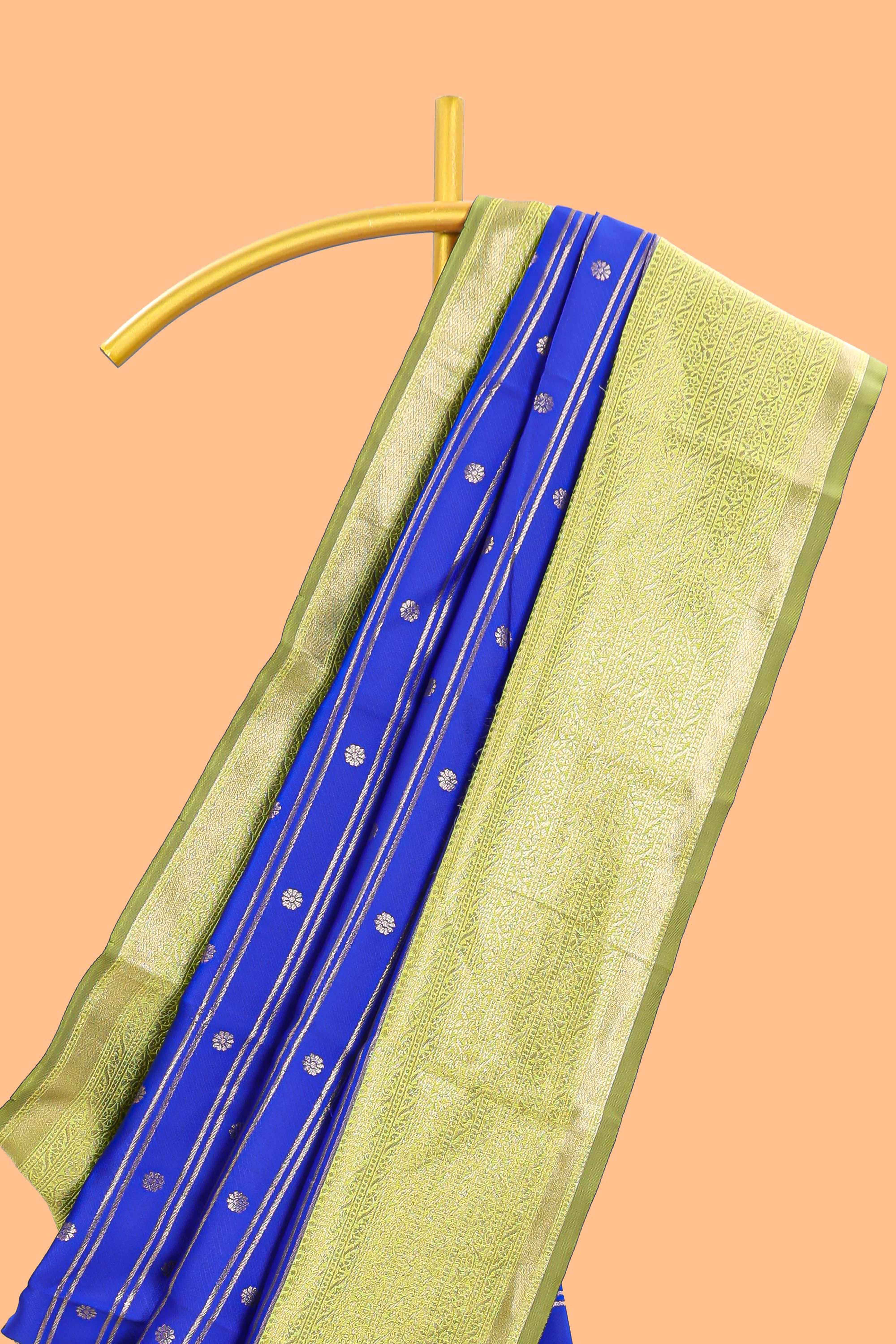Blule striped and butta detailed Semi Soft Silk Saree with contrast zari border along with contrasting blouse