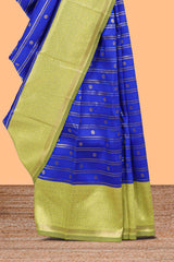Blule striped and butta detailed Semi Soft Silk Saree with contrast zari border along with contrasting blouse
