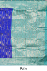Blule striped and butta detailed Semi Soft Silk Saree with contrast teal blue zari border along with contrasting blouse