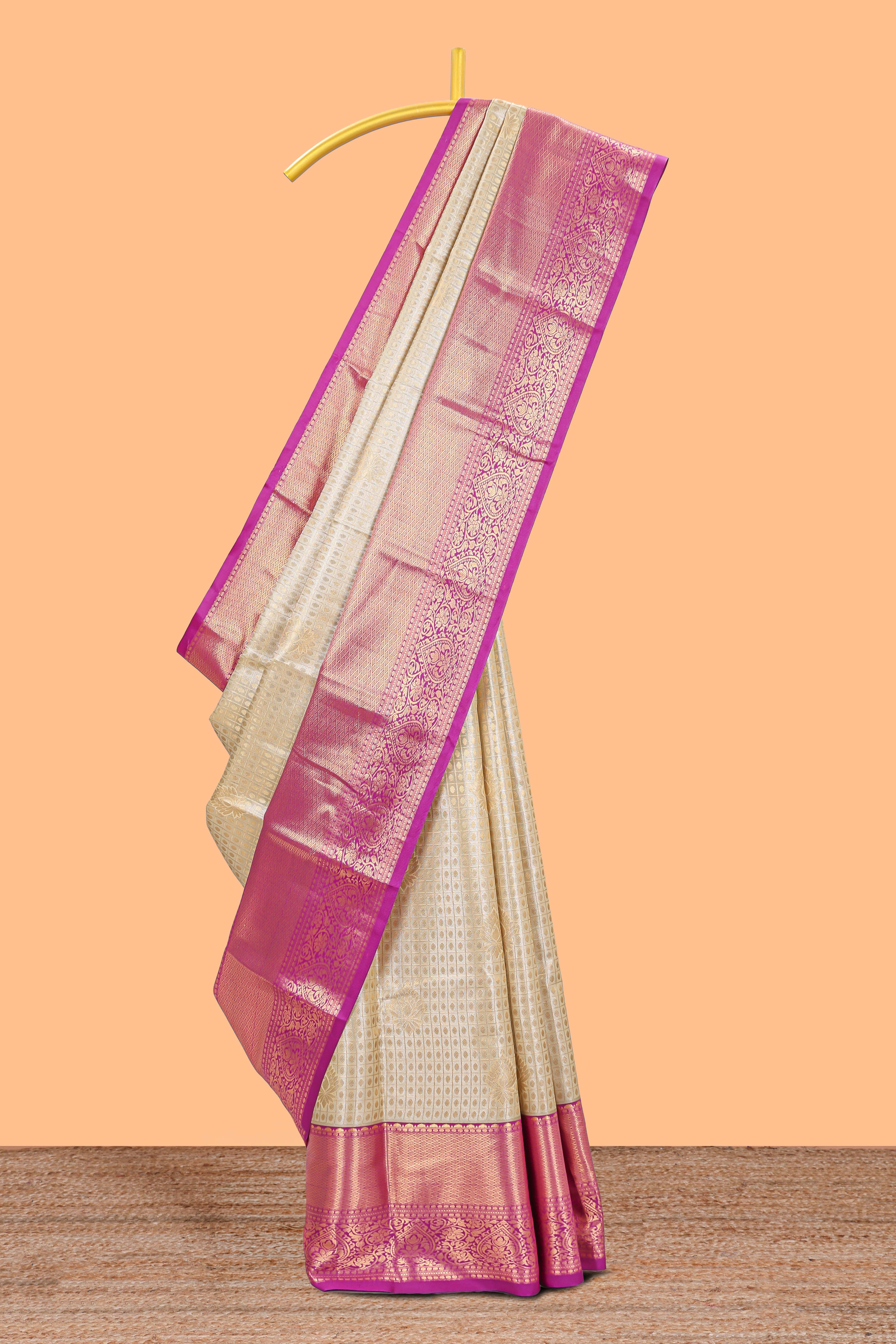 Cream shade checked butta design Semi Soft Silk Saree with pink contrast zari border along with contrasting blouse