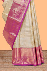 Cream shade checked butta design Semi Soft Silk Saree with pink contrast zari border along with contrasting blouse