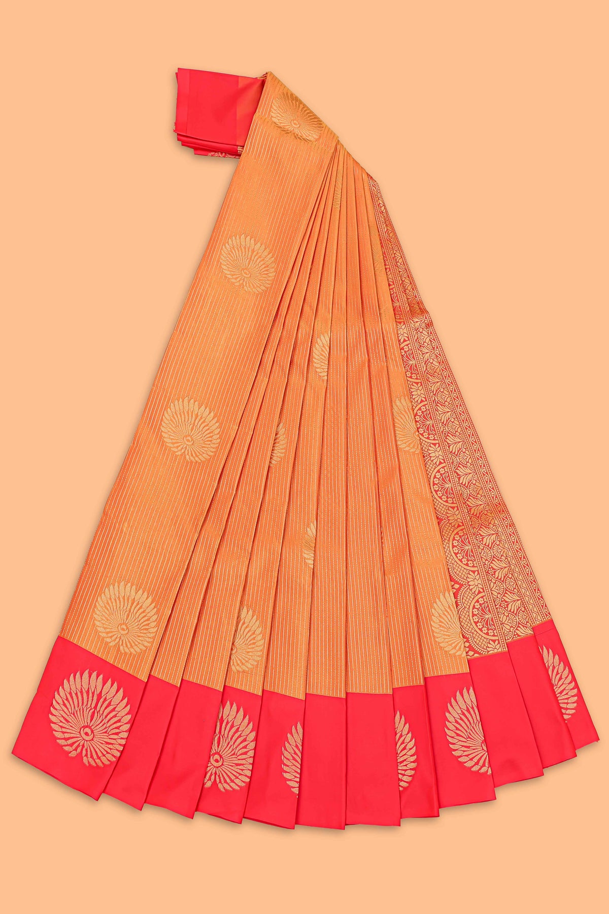 Orange striped zari motifs semi soft silk saree with contrast border and blouse