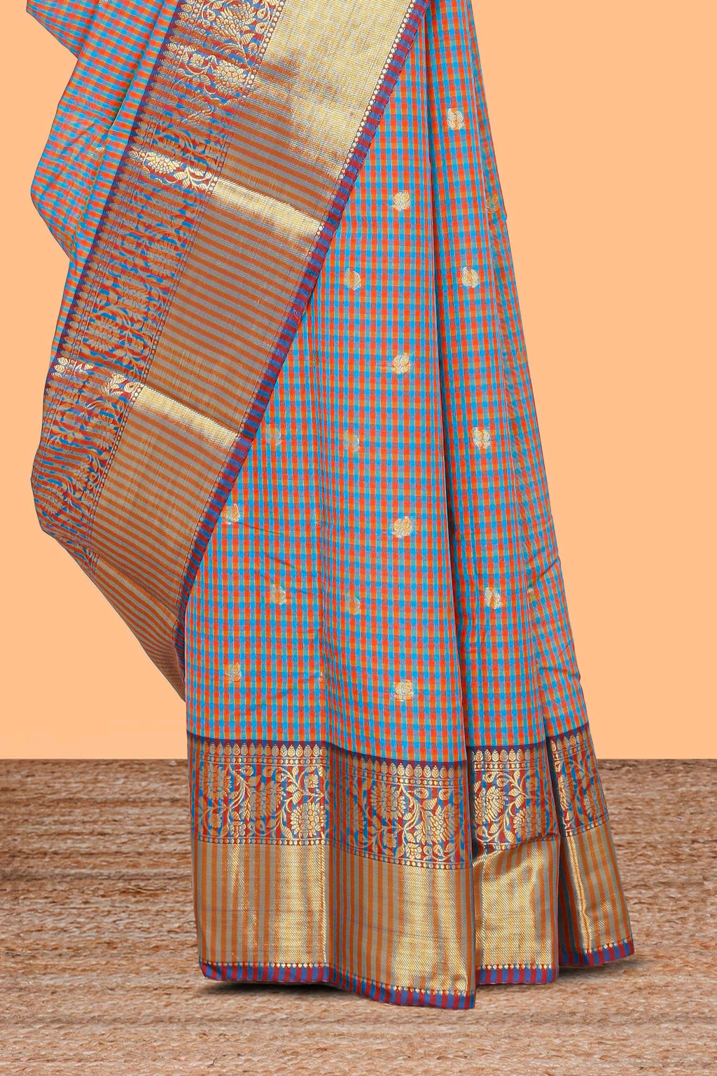 Multi color checked zari motifs semi soft silk saree with contrast border and motifs blouse