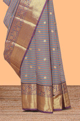 Multi color checked zari motifs semi soft silk saree with contrast border and motifs blouse