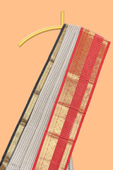 Silver checked semi soft silk saree with contrast zari border and matching striped blouse