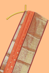 Orange and pink checked zari motifs semi soft silk saree with contrast zari border and motifs blouse