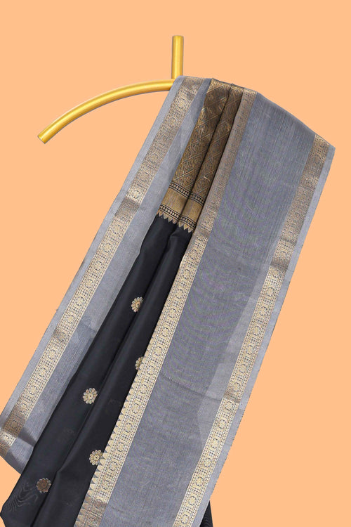 Black zari motifs designed semi soft silk saree with contrast border and zari blouse