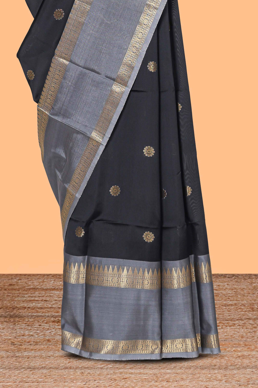Black zari motifs designed semi soft silk saree with contrast border and zari blouse
