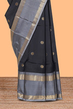 Black zari motifs designed semi soft silk saree with contrast border and zari blouse