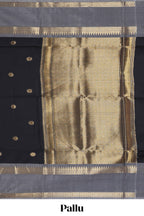 Black zari motifs designed semi soft silk saree with contrast border and zari blouse