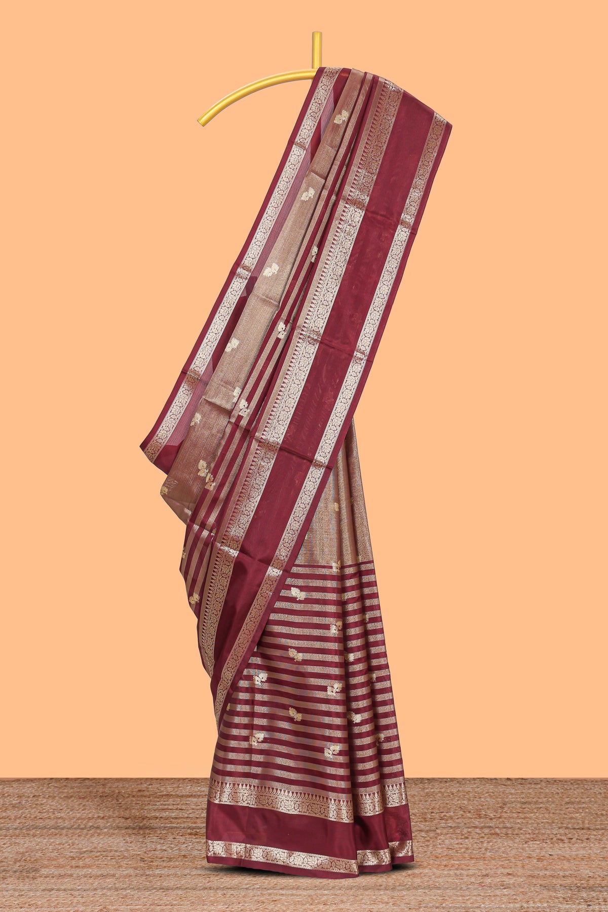 Maroon floral zari motifs design semi soft silk saree with self zari border and matching striped blouse