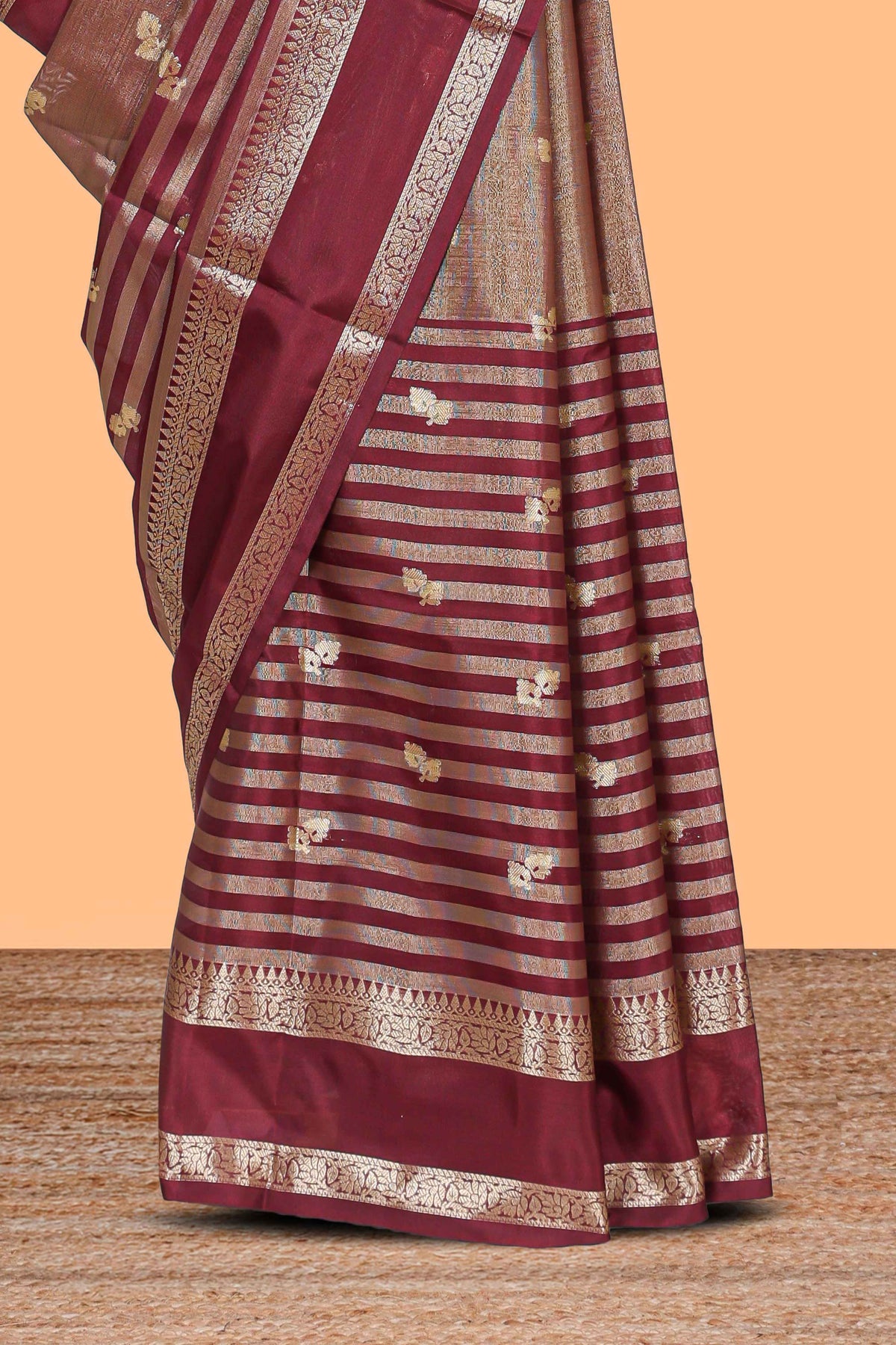 Maroon floral zari motifs design semi soft silk saree with self zari border and matching striped blouse