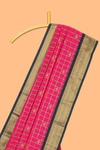 Pink checked floral motifs design semi soft silk saree with contrast border and striped blouse