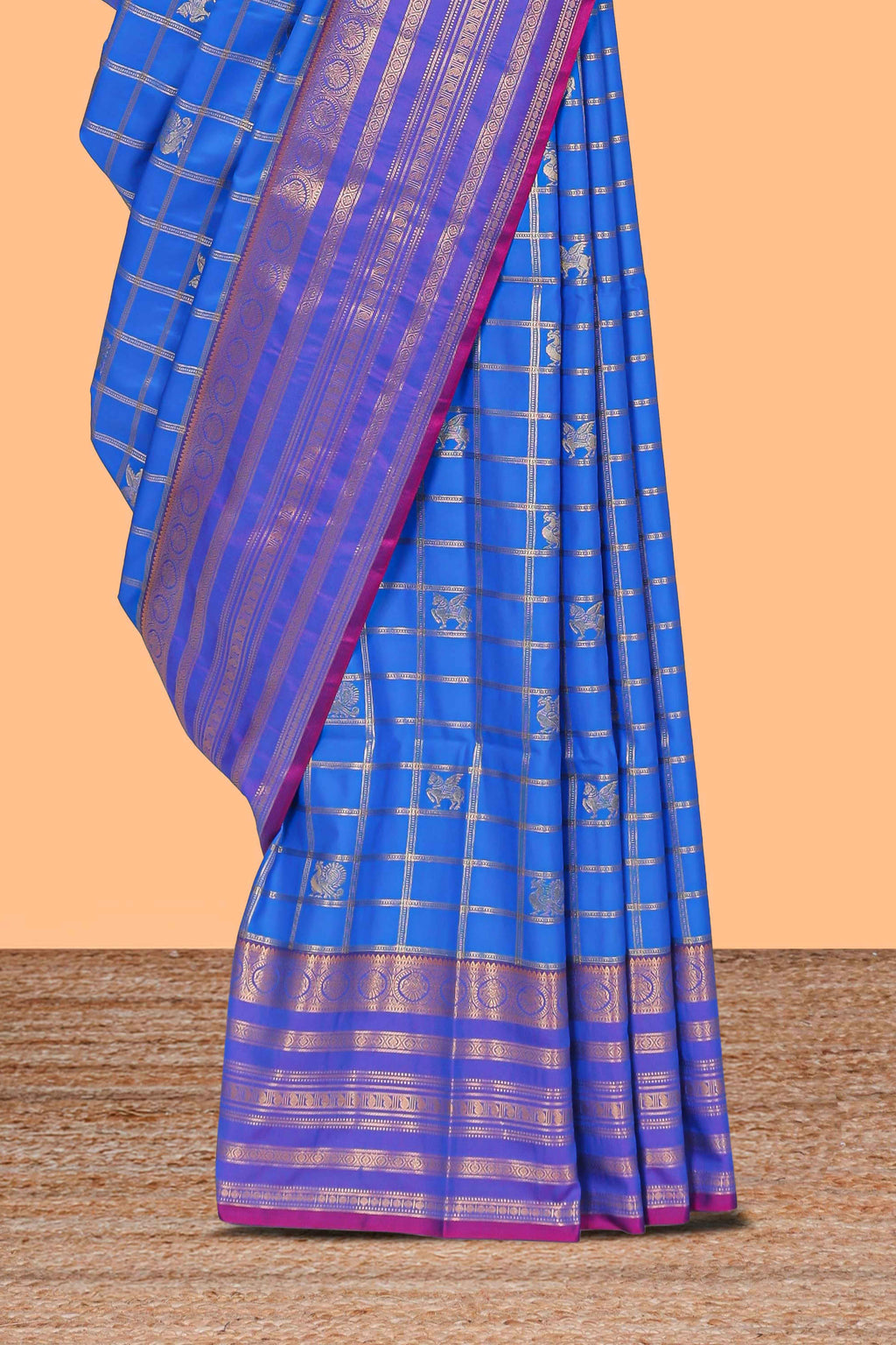 Blue checked peacock and unicorn motifs design semi soft silk saree with contrast border and blouse