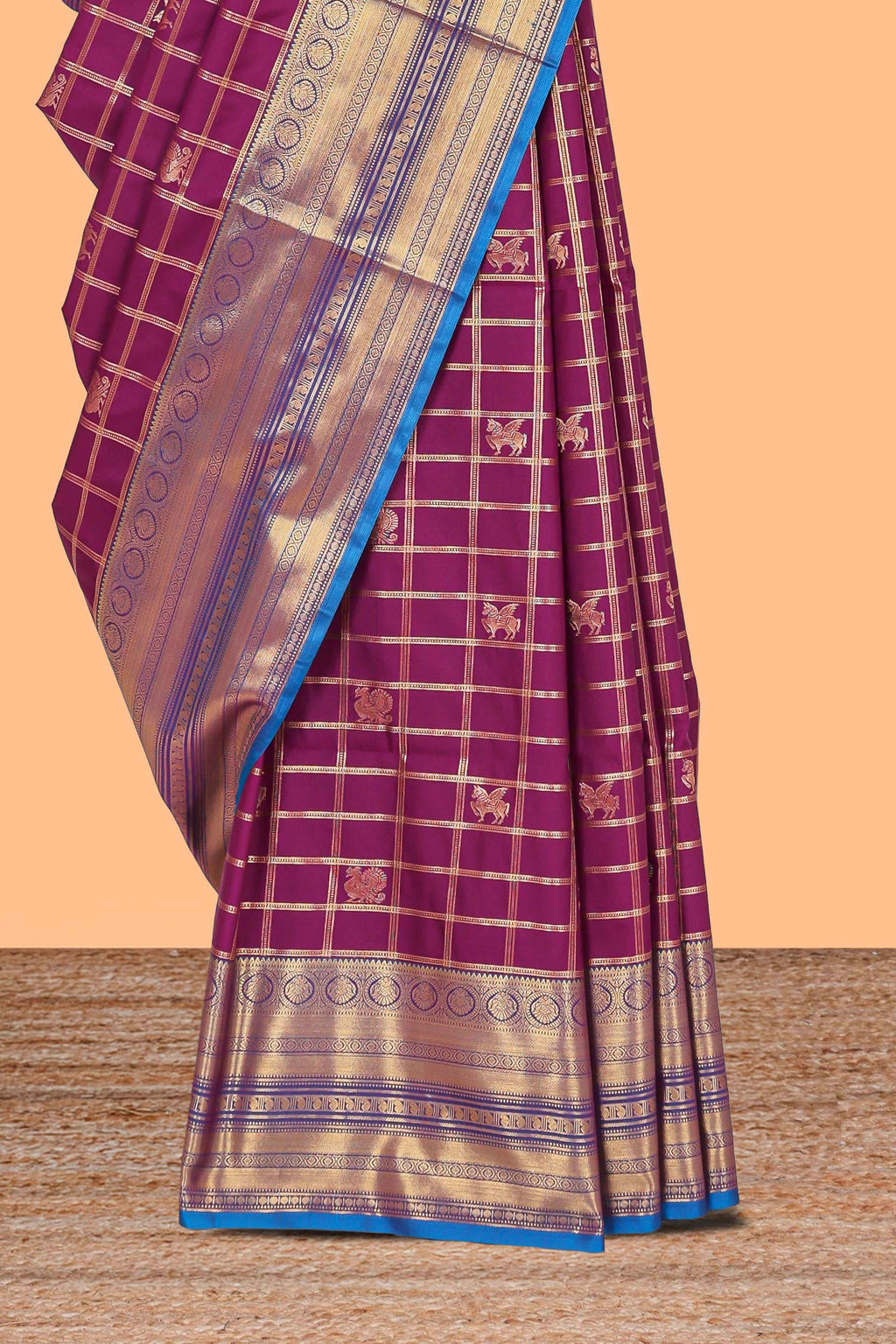 Purple checked peacock and unicorn motifs design semi soft silk saree with contrast border and blouse
