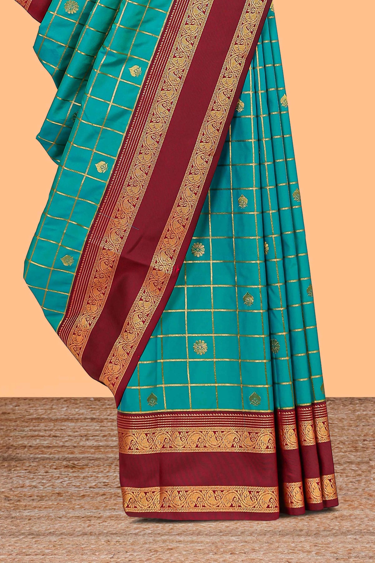 Viridian green checked floral zari motifs design semi soft silk saree with contrast border and blouse