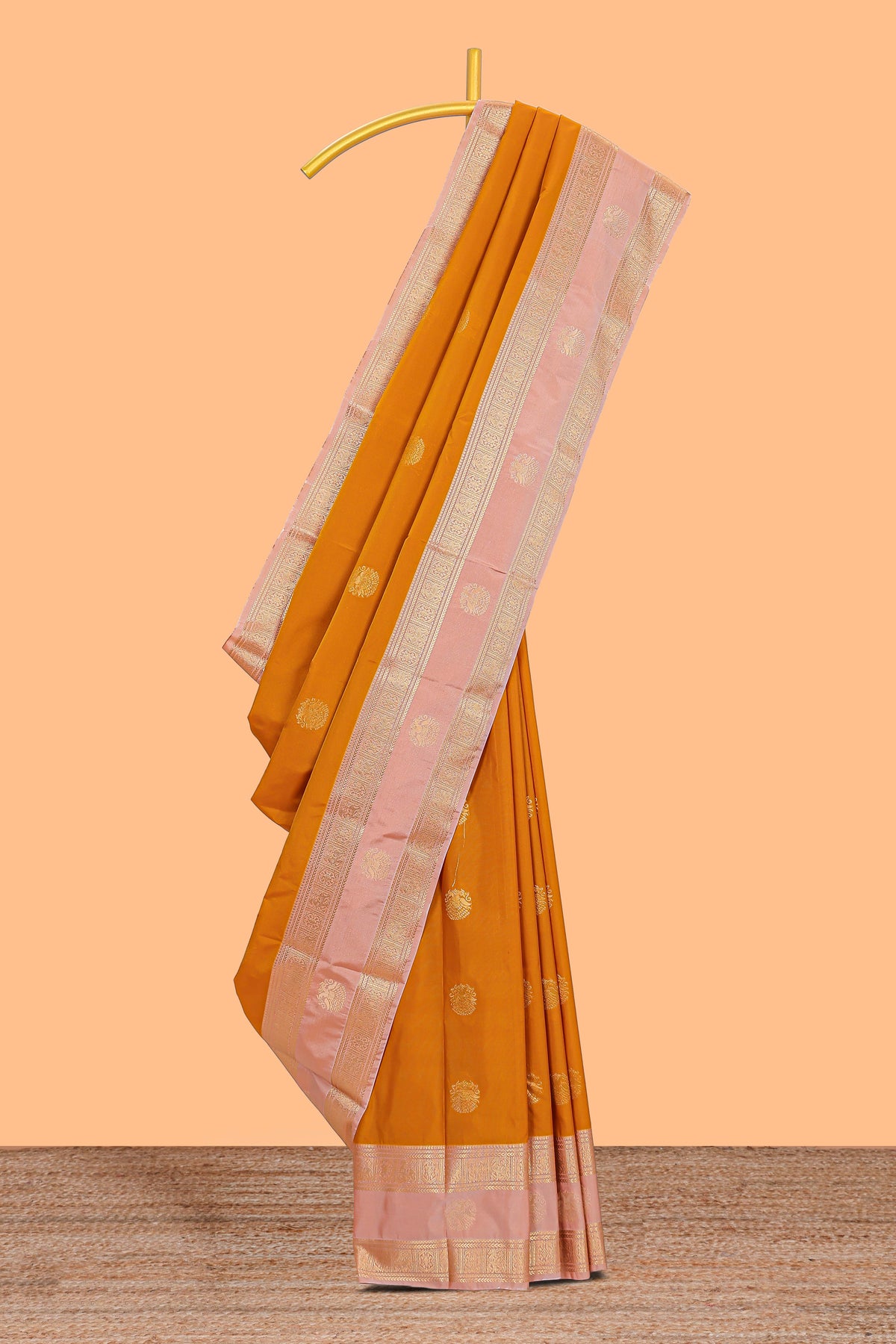 Mustard zari motifs design semi soft silk saree with contrast border and blouse